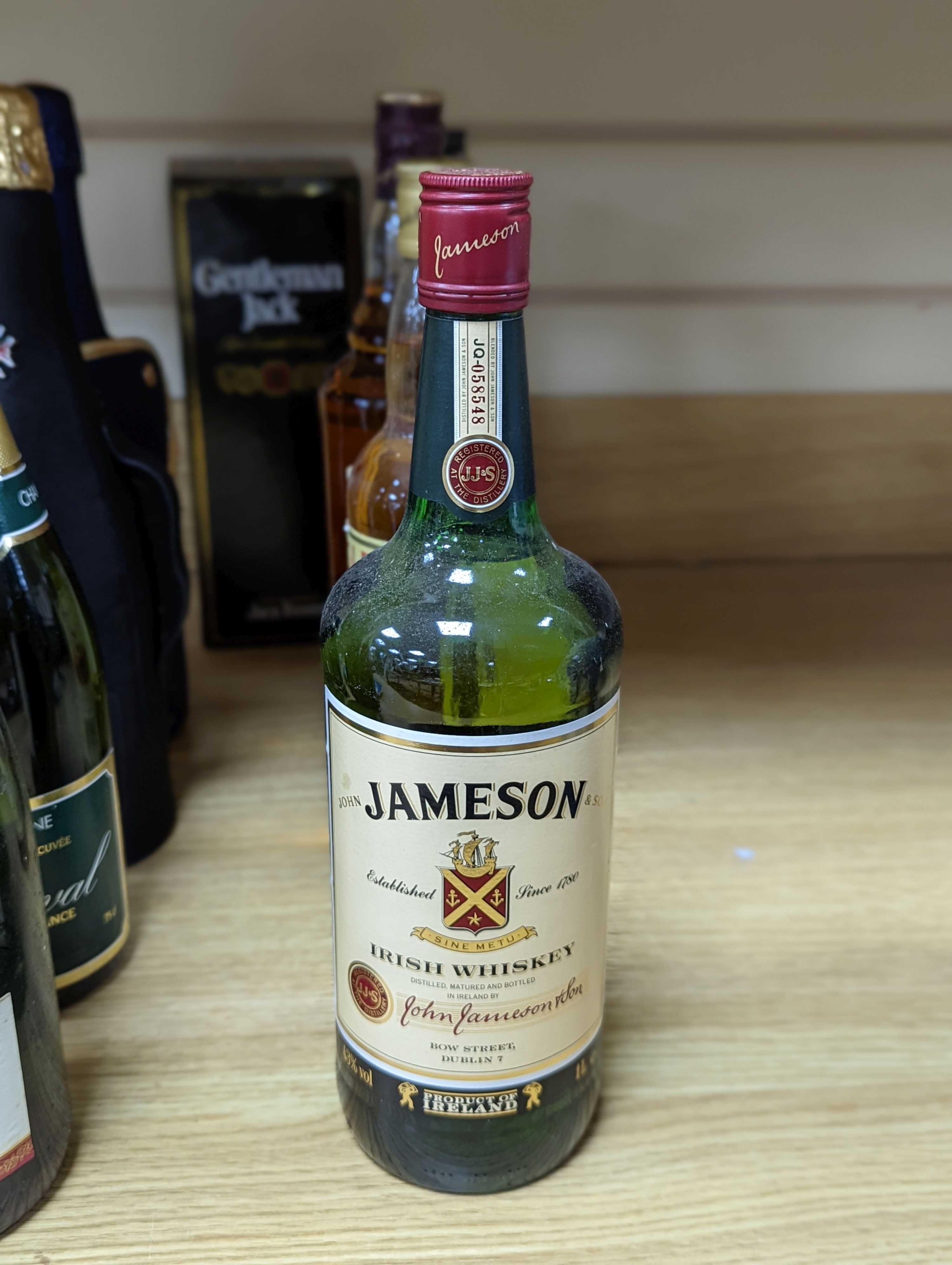 A collection of various whiskies and champagnes (12 bottles)